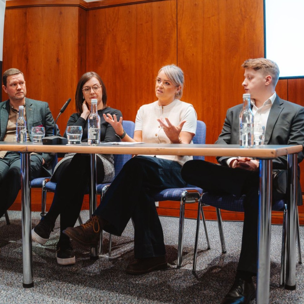 Money Ready Deputy CEO Claire Quigley sitting on a panel
