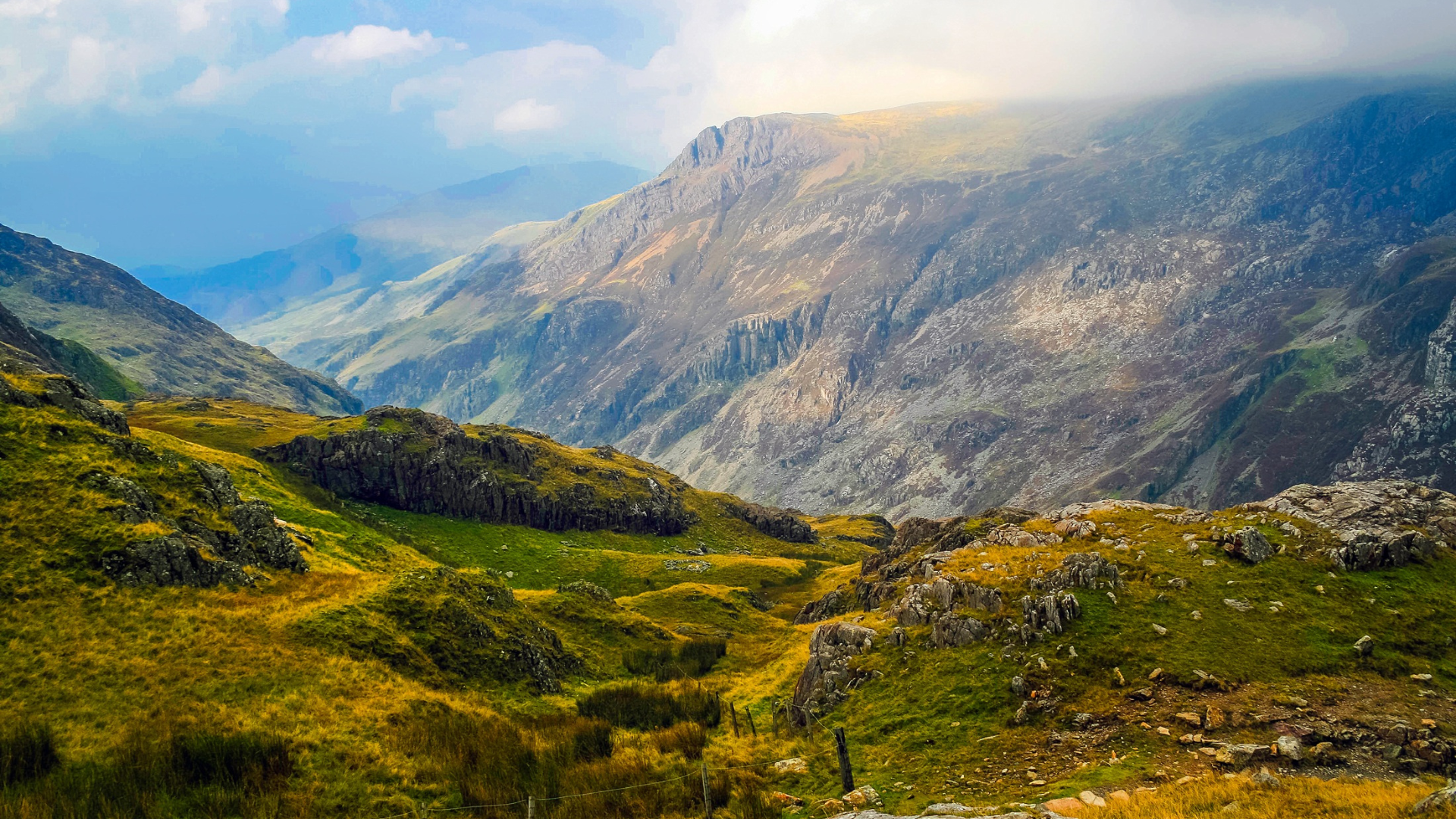 a picture of a beautiful landscape showing a mountain and the blue sky