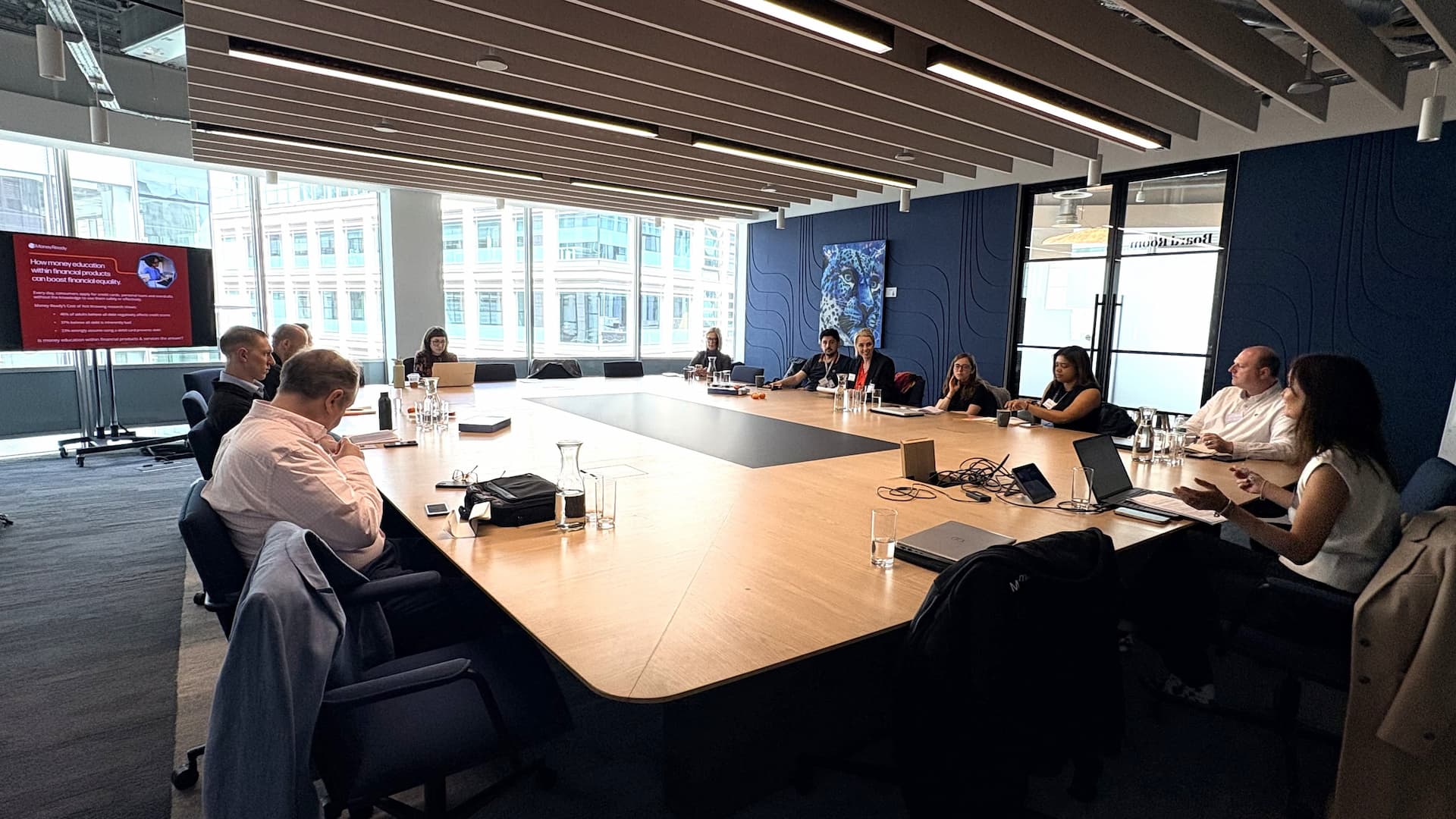 Participants at a roundtable discussion sat round a boardroom table